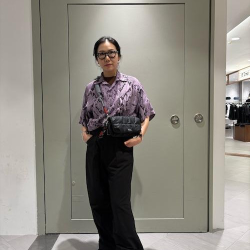 The black pants with a handle stand out is B...