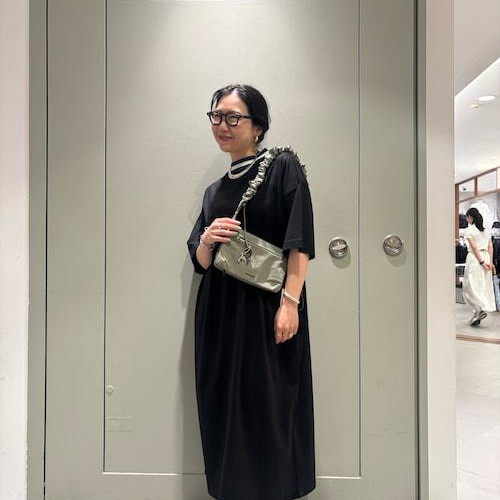 It's a simple dress, but it's around the neck...