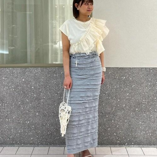 A light pearl or a tight skirt...