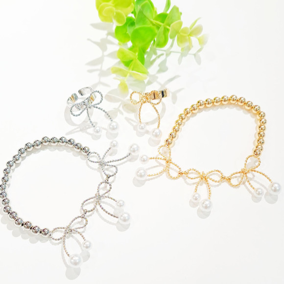 Pearl × ribbon bracelet ring