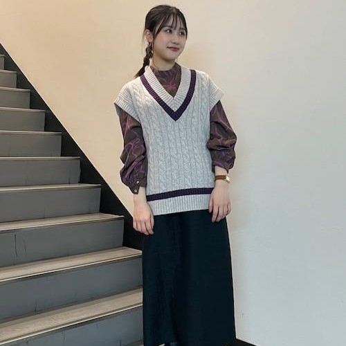 ฉันใช้เสื้อกั๊กคาร์ดิแกนขนแกะ...