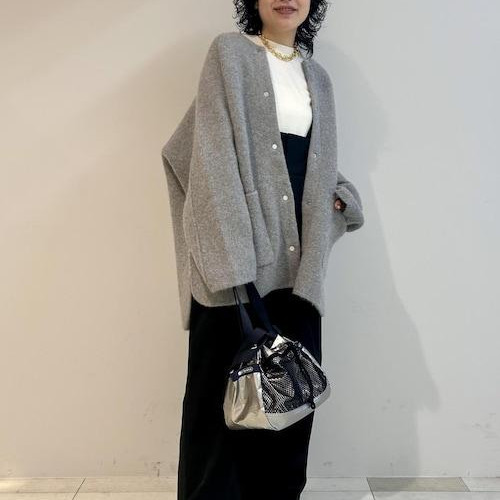 Between the coat and the cardigan....