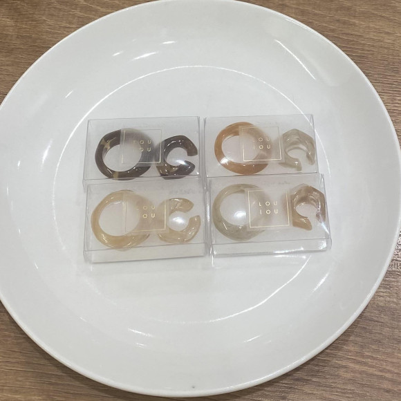 A set of acrylic earkuffs and rings