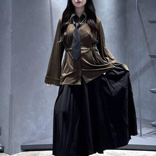 ウエストにタックが入るのでより...