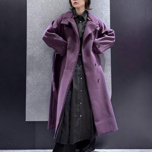 Long coe made of wooly tech material...