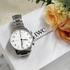 IWC Portogyse with a large case, slim leaf needle, and rounded design.