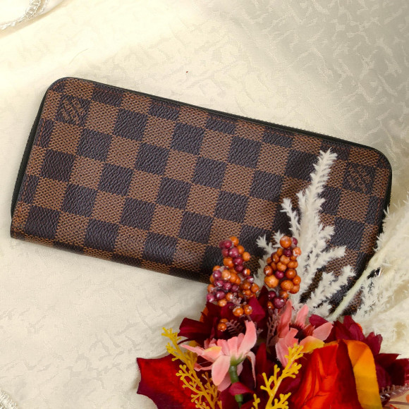 Zippy wallet from Louis Vuitton Damier, a popular line for men and women
